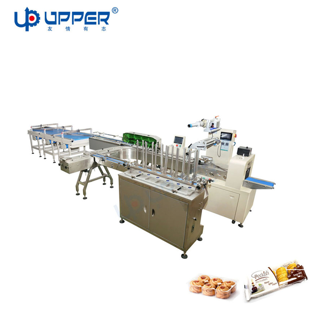 Machine d'emballage de biscuits dans le plateau